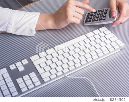 Businesswoman in Business suit Analyzing data and plan 8284502