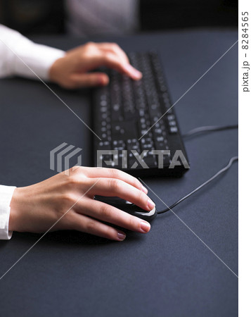 Business Woman Typing on Computer Keyboard Business Woman Typing on Computer Keyboard 8284565