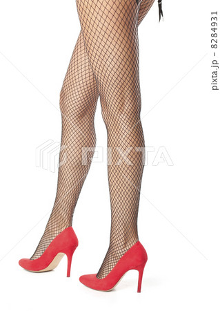 Girl legs in fishnet stocking 8284931