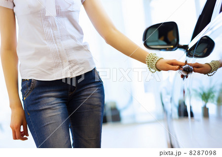 Young lady at car salon Young lady at car salon 8287098