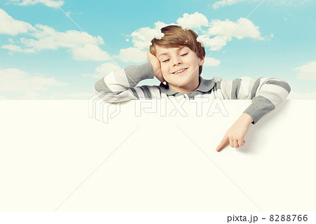 Boy with a blank billboard Boy with a blank billboard 8288766