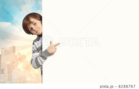 Boy with a blank billboard 8288767