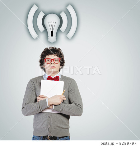 Young man with papers and light bulb Young man with papers and light bulb 8289797