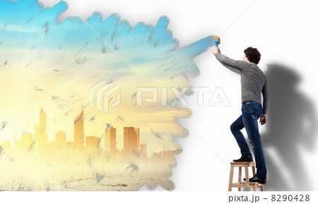Young man and cityscape on the wall 8290428