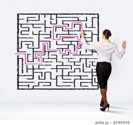 Businesswoman solving maze problem 8290949