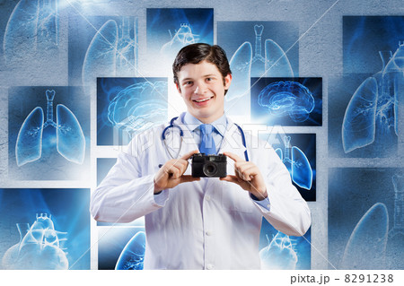 Doctor with photo camera 8291238