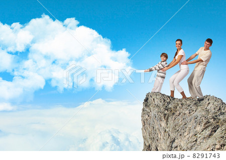 Young family pulling banner 8291743