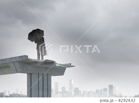 Businessman standing on bridge 8292632