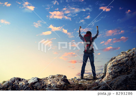 Young tourist atop of mountain 8293286