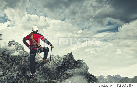 Young tourist atop of mountain 8293287