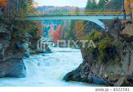 Muddy Waterfall on Autumn Mountain River Muddy Waterfall on Autumn Mountain River 8322581