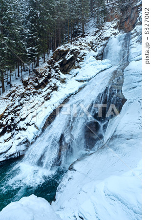 Alps waterfall winter view 8327002