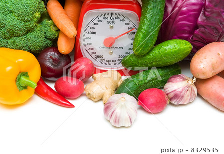 kitchen scale and vegetables close-up kitchen scale and vegetables close-up 8329535
