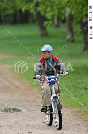 Boy on a bicycle 8333360
