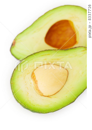 two halves of avocado isolated on white 8337716
