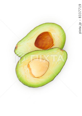 two halves of avocado isolated on white 8337719
