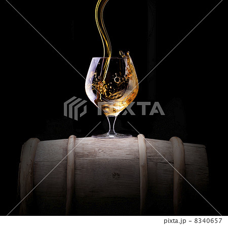 Cognac or brandy on a black 8340657