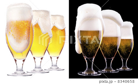 glass of light beer on black and white 8340658