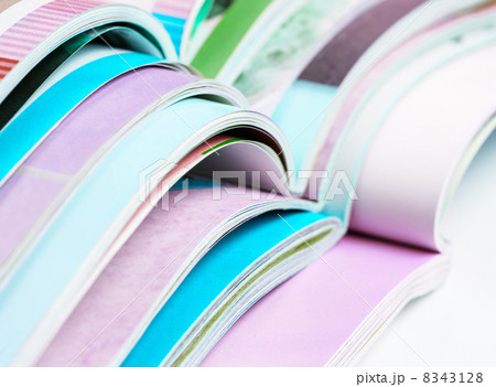 Pile of opened magazines 8343128