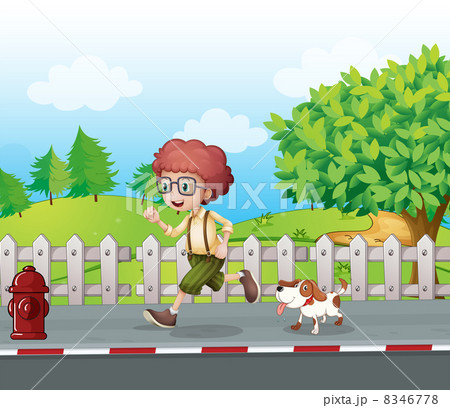 A boy running along the road with his pet A boy running along the road with his pet 8346778