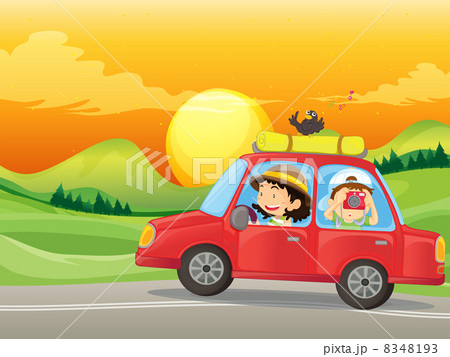 A girl and a boy riding in a red car A girl and a boy riding in a red car 8348193