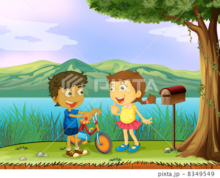 A young boy holding a bike and a girl near a wooden mailbox 8349549