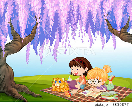 Girls reading at the park with a cat Girls reading at the park with a cat 8350877