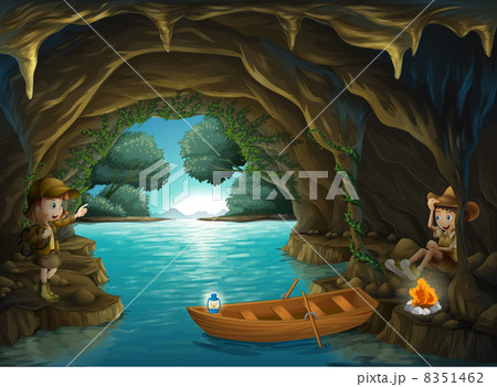 A young girl and boy inside the cave 8351462