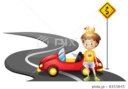 A young boy and his car at the road near the yellow signboard 8353645
