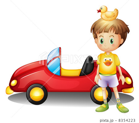 A young boy with a rubber duck and a big toy car A young boy with a rubber duck and a big toy car 8354223