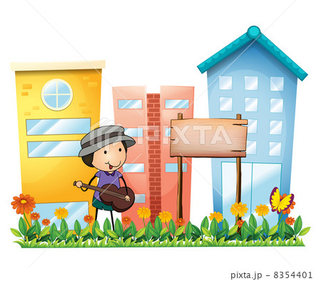 A man playing with a guitar beside a wooden signboard A man playing with a guitar beside a wooden signboard 8354401