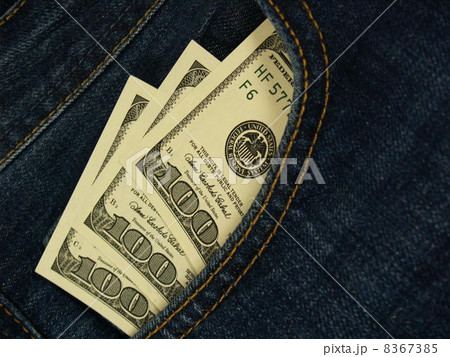 Hundred dollar bills in jeans pocket, close up Hundred dollar bills in jeans pocket, close up 8367385