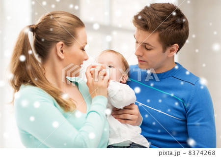 family and adorable baby with feeding-bottle family and adorable baby with feeding-bottle 8374268