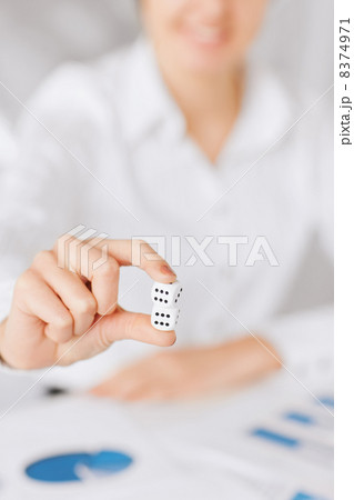 man hands with gambling dices signing contract man hands with gambling dices signing contract 8374971