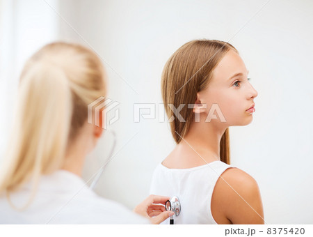 doctor with stethoscope listening to the patient 8375420