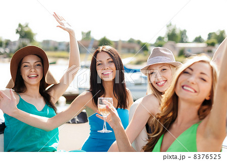 girls with champagne glasses on boat girls with champagne glasses on boat 8376525