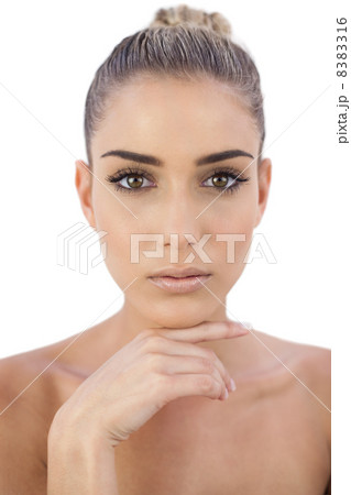 Concentrated woman looking at camera 8383316