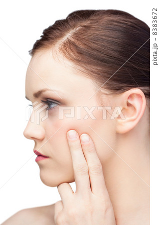 Thinking attractive brunette posing 8383672