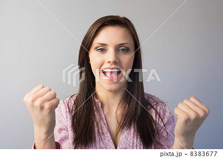 Triumphant classy brunette posing Triumphant classy brunette posing 8383677