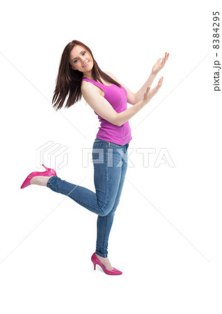 Cheerful stylish brunette wearing high shoes posing 8384295