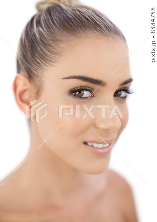 Smiling woman looking at camera 8384758