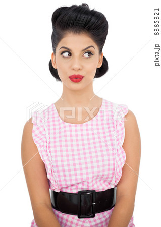 Serious black hair model looking away Serious black hair model looking away 8385321