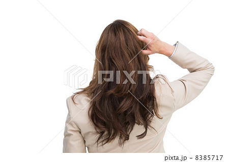 Rear view of classy businesswoman scratching her head Rear view of classy businesswoman scratching her head 8385717