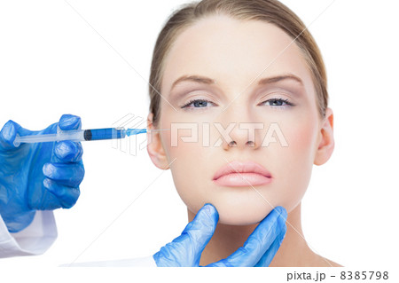 Content attractive model having botox injection on the cheek Content attractive model having botox injection on the cheek 8385798