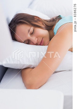 Attractive brunette sleeping peacefully in bed Attractive brunette sleeping peacefully in bed 8386276