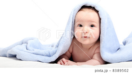beautiful baby after bath under a blanket beautiful baby after bath under a blanket 8389502