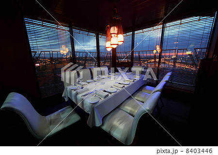 table with white tablecloth and serving and white chairs in rest table with white tablecloth and serving and white chairs in rest 8403446