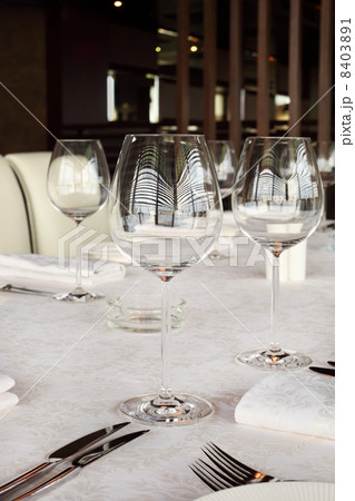 beautiful serving at table with white tablecloth in restaurant; 8403891