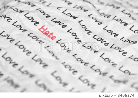The word hate, love written on a crumpled piece of closeup. The word hate, love written on a crumpled piece of closeup. 8406374