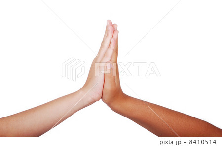Two children hands touching each other, isolated Two children hands touching each other, isolated 8410514